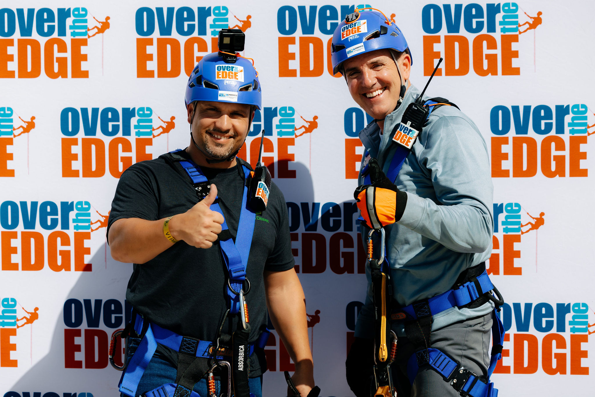 Posing for Over The Edge with Banner