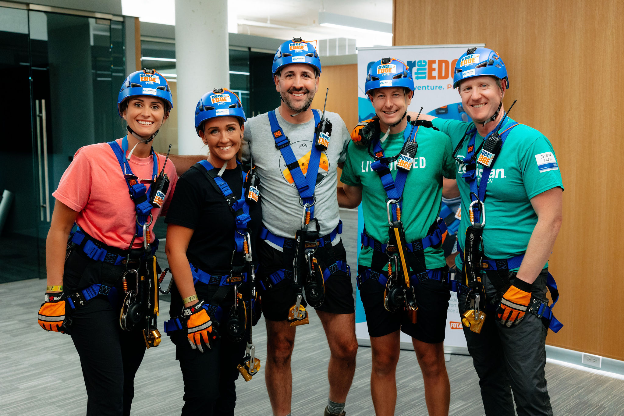 Group Smiling in Rappel Gear