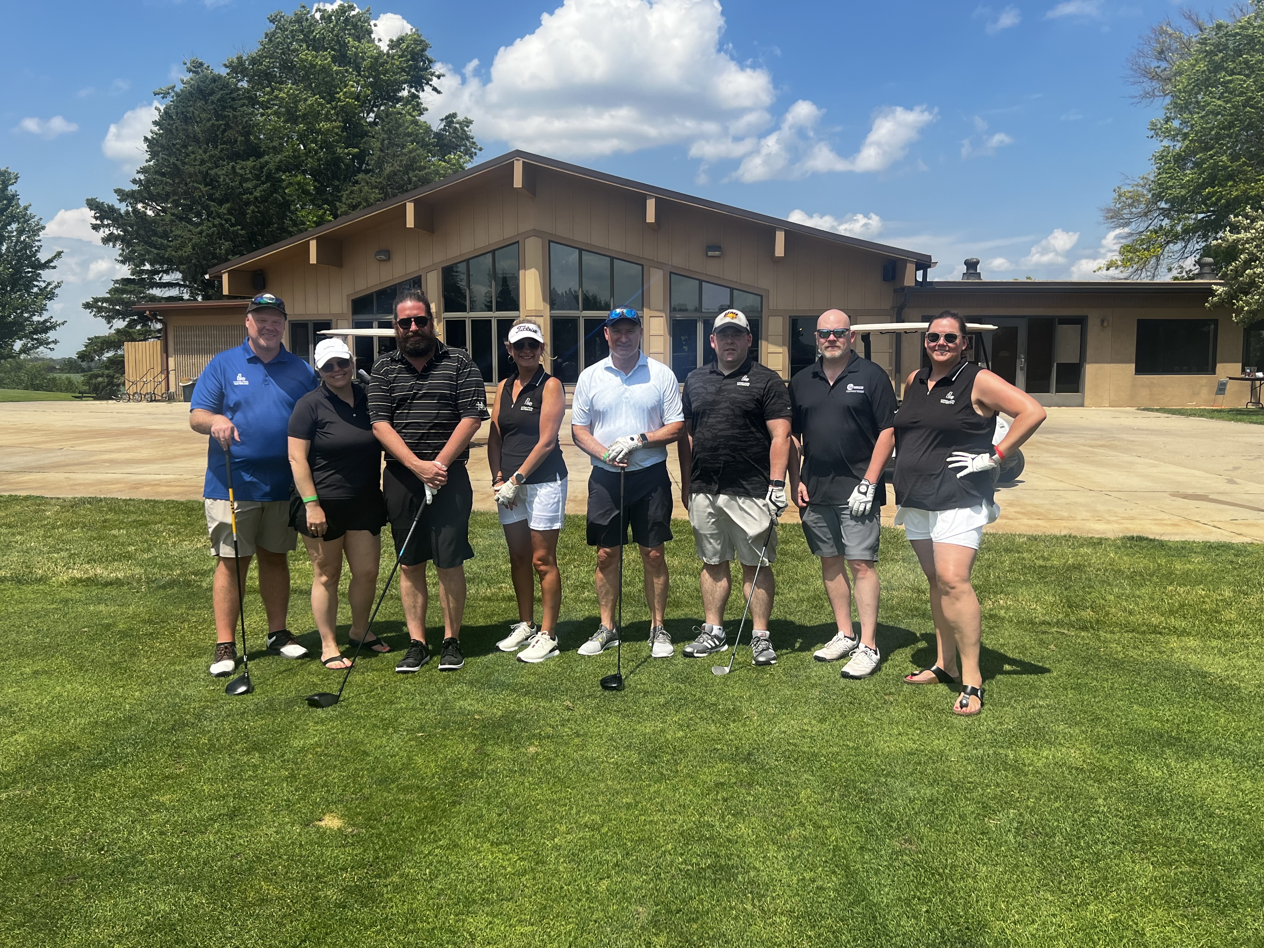 Golf Team in front of Clubhouse